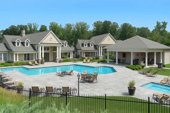 A large house with a pool in the backyard.